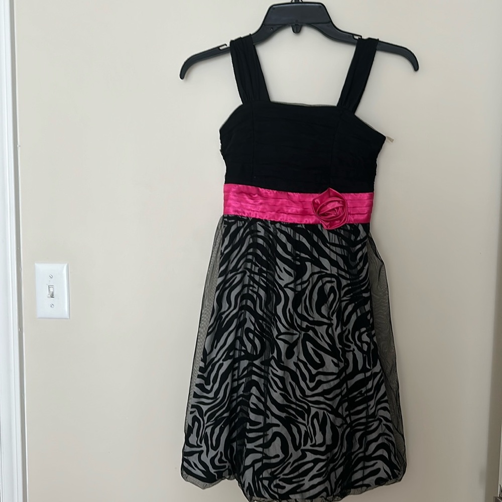 Speechless dress is black tulle over zebra fabric. Size 12